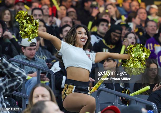 Member of the Vegas Golden Knights Vegas Vivas cheerleaders cheers before the Golden Knights' game against the Los Angeles Kings at T-Mobile Arena on...