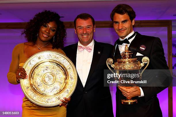 Wimbledon Singles Champions Serena Williams and Roger Federer pose with Philip Brook Chairman of the All England Lawn Tennis Club attend the...