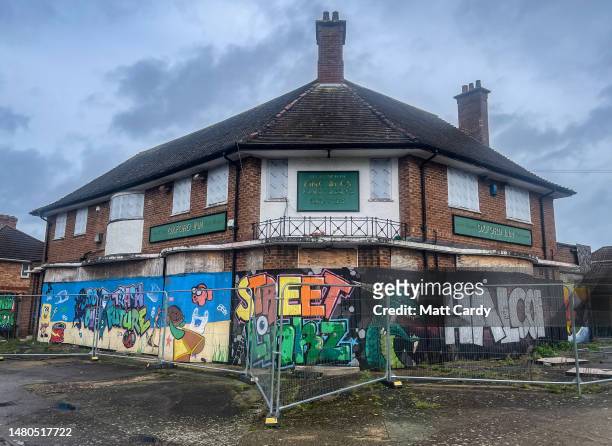 Pub, which has closed its doors to customers, is surrounded by fencing and has had its windows boarded-up on April 01, 2023 in Taunton, England....
