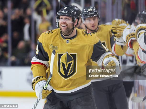 Phil Kessel of the Vegas Golden Knights celebrates with teammates on the bench after scoring a first-period goal against the Los Angeles Kings during...