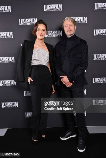 Phoebe Waller-Bridge and Mads Mikkelsen attend the Indiana Jones and the Dial of Destiny presentation during the studio panel at Star Wars...