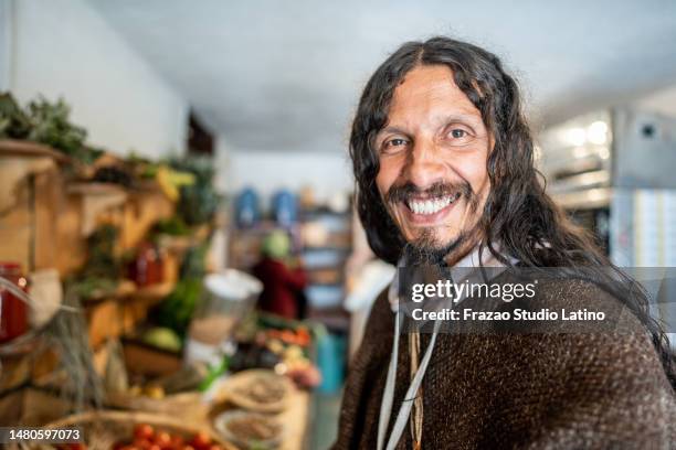 portrait of a mature man at small local store - goatee 個照片及圖片檔