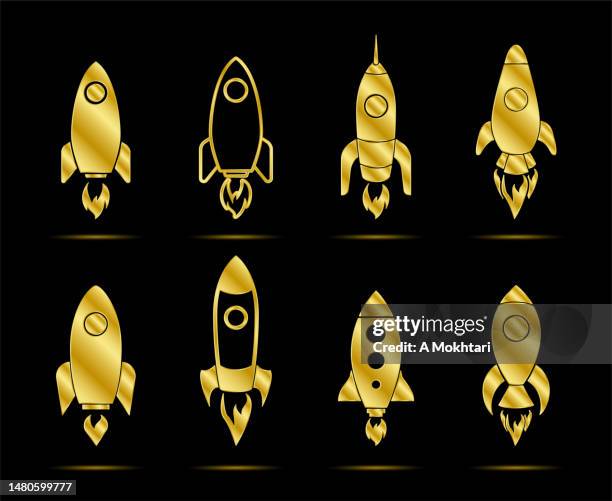 golden rocket icon set. - walleye stock illustrations