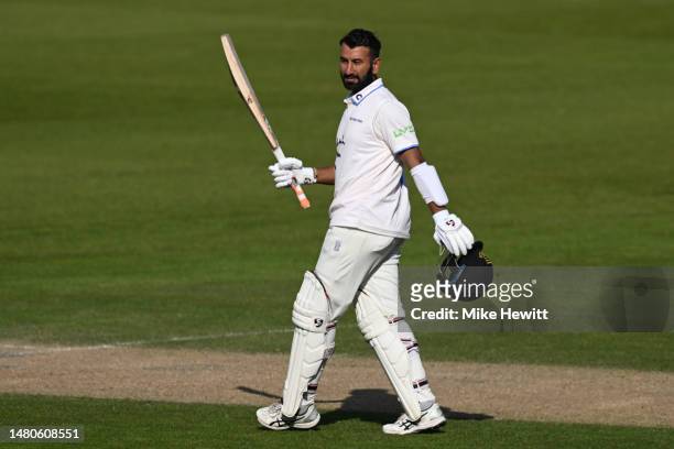 Cheteshwar Pujara of Sussex celebrates reaching his century during the LV= Insurance County Championship Division 2 match between Sussex and Durham...