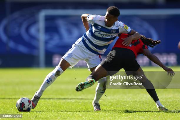 Chris Willock of Queens Park Rangers is challenged by Daniel Johnson of Preston North End during the Sky Bet Championship between Queens Park Rangers...