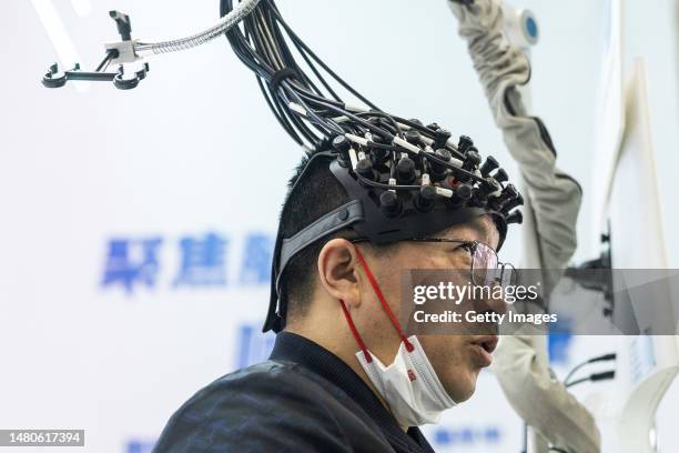 The guest experience medical equipment during the 2023 World Health Expo held in Wuhan International Expo Center on April 7,2023 in Wuhan, Hubei...