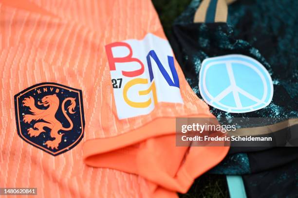 The Belgium, Germany, and Netherlands 2027 FIFA Women's World Cup bid badge is seen on a Netherlands shirt prior to the Women's international...