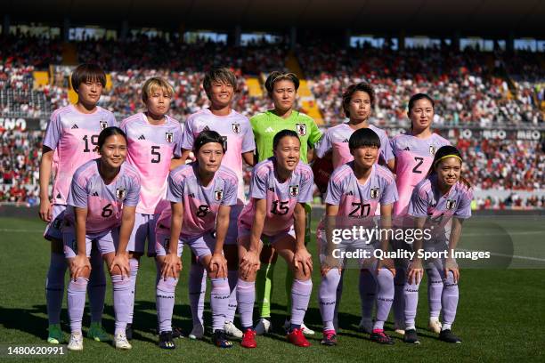 Japan players line up for the team photos prior to the international friendly match between Portugal and Japan at Estadio Dom Afonso Henriques on...