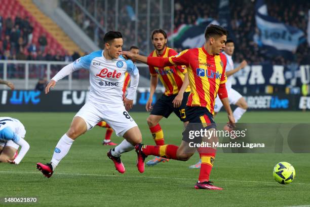 Joan Gonzalez of Lecce competes for the ball with Giacomo Raspadori of Napoli during the Serie A match between US Lecce and SSC Napoli at Stadio Via...