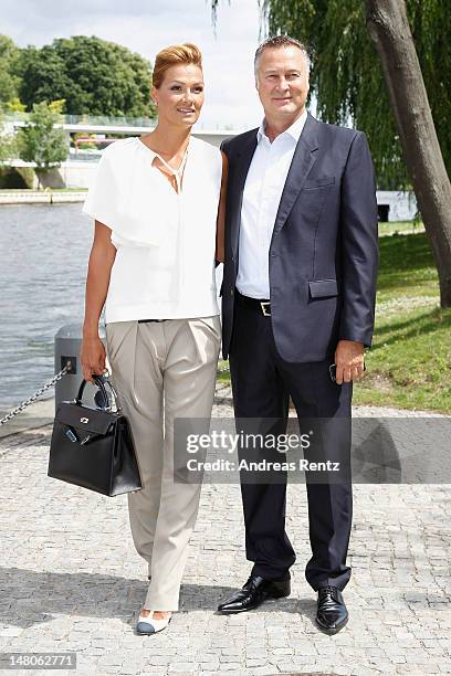 Franziska van Almsick and Juergen B. Harder arrive for a boat tour with the Monaco royal couple on the Spree canal on July 9, 2012 in Berlin,...