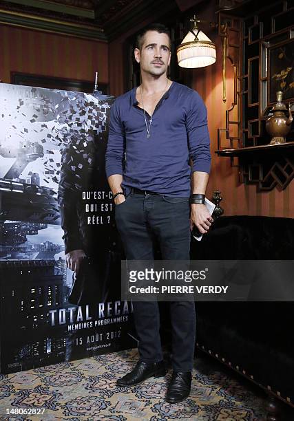 Irish actor Colin Farrell poses during a photocall as part of the presentation of his latest film "Total Recall" on July 9, 2012 at the Hotel Costes...