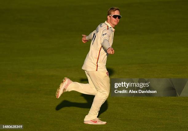 Simon Harmer of Essex celebrates taking the wicket of Ryan Higgins during Day 2 of the LV= Insurance County Championship Division 1 match between...