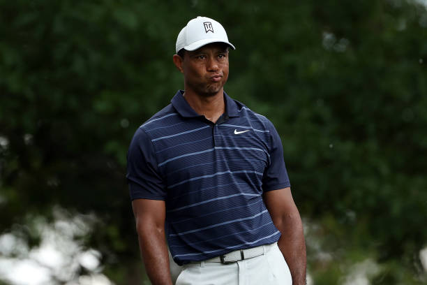 Tiger Woods of the United States reacts to his shot from the fourth tee during the second round of the 2023 Masters Tournament at Augusta National...
