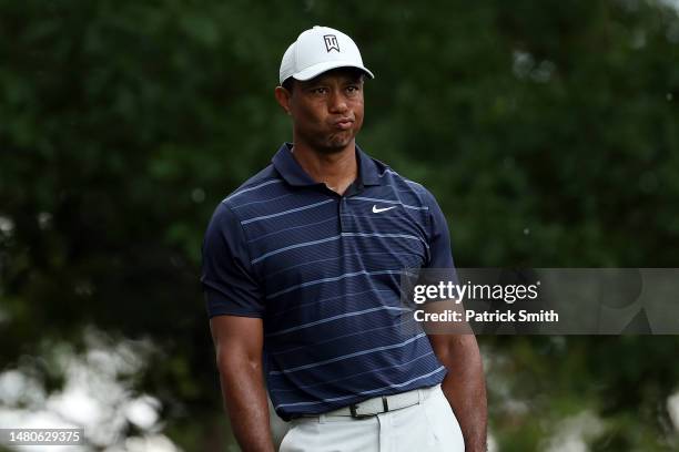 Tiger Woods of the United States reacts to his shot from the fourth tee during the second round of the 2023 Masters Tournament at Augusta National...