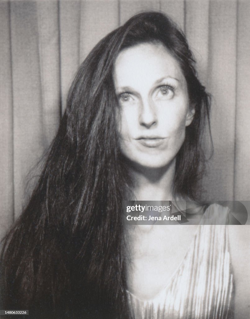 Photo Booth Portrait Woman Looking Up Daydreaming, Cool Woman with Long Hair in Photobooth, Retro Woman Portrait