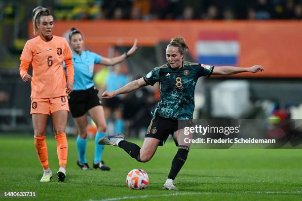 Sydney Lohmann of Germany shoots as Jill Roord of Netherlands looks on during the Women's international friendly match between Netherlands and...