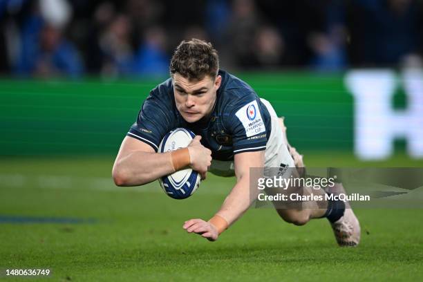 Garry Ringrose of Leinster Rugby dives to score the teams first try during the Heineken Champions Cup Quarter Finals match at Aviva Stadium on April...