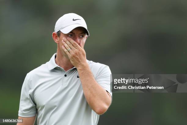 Rory McIlroy of Northern Ireland reacts to a putt on the 18th green during the second round of the 2023 Masters Tournament at Augusta National Golf...