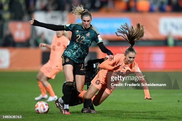 Lieke Martens of Netherlands is tackled by Jule Brand of Germany during the Women's international friendly match between Netherlands and Germany at...