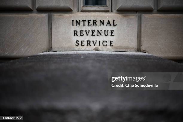 Small sign indicates the headquarters of the Internal Revenue Service on April 07, 2023 in Washington, DC. The Treasury Department announced an $80...