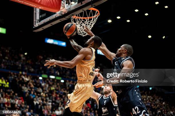 Cory Higgins of FC Barcelona and Kyle Hines of EA7 Emporio Armani Milan during the 2022/2023 Turkish Airlines EuroLeague match between EA7 Emporio...