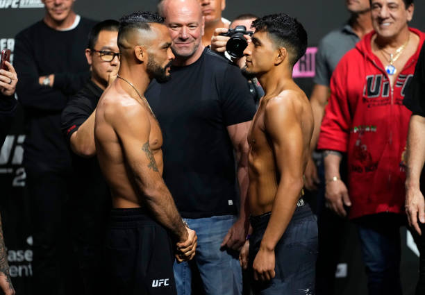 Opponents Rob Font and Adrian Yanez face off during the UFC 287 ceremonial weigh-in at Kaseya Center on April 07, 2023 in Miami, Florida.