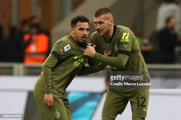 Ante Rebic of AC Milan speaks to teammate Ismael Bennacer during the Serie A match between AC Milan and Empoli FC at Stadio Giuseppe Meazza on April...