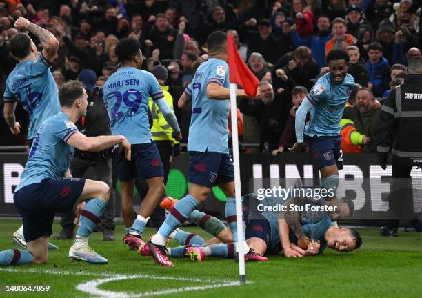 Burnley player Connor Roberts celebrates with team mates after scoring the second Burnley goal during the Sky Bet Championship between Middlesbrough...