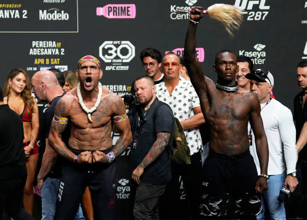 Opponents Alex Pereira of Brazil and Israel Adesanya of Nigeria pose during the UFC 287 ceremonial weigh-in at Kaseya Center on April 07, 2023 in...