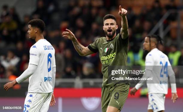 Olivier Giroud of AC Milan reacts during the Serie A match between AC Milan and Empoli FC at Stadio Giuseppe Meazza on April 07, 2023 in Milan, Italy.