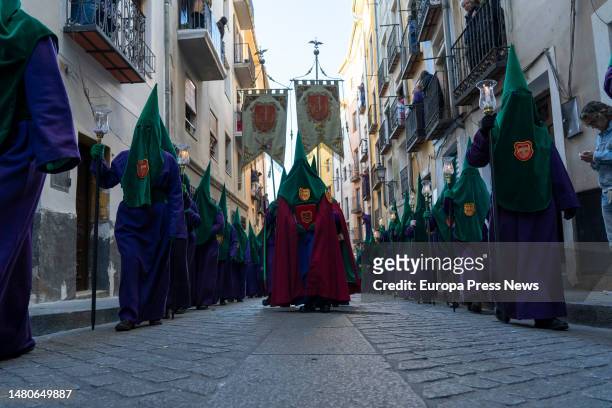 Nazarenes during the Calvary procession on Good Friday in Cuenca, April 6 in Cuenca, Castilla-La Mancha, Spain. The procession begins at 05:30 am...