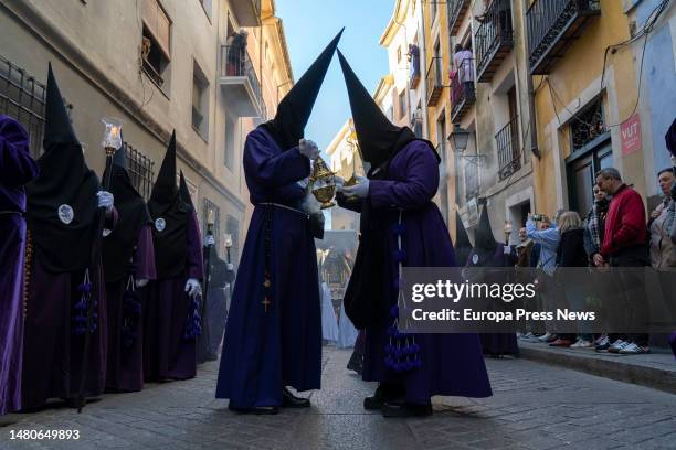 Nazarenes during the Calvary procession on Good Friday in Cuenca, April 6 in Cuenca, Castilla-La Mancha, Spain. The procession begins at 05:30 am...