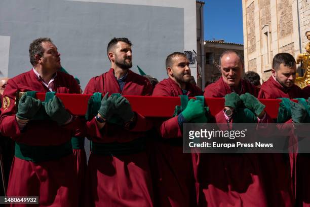Costaleros during the Calvary procession on Good Friday in Cuenca, April 6 in Cuenca, Castilla-La Mancha, Spain. The procession begins at 05:30 am...