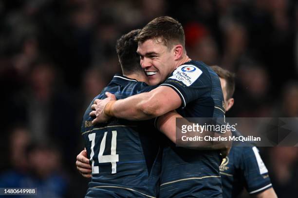 Garry Ringrose of Leinster Rugby celebrates with teammate Jimmy O'Brien after he scores the team's fifth try during the Heineken Champions Cup...