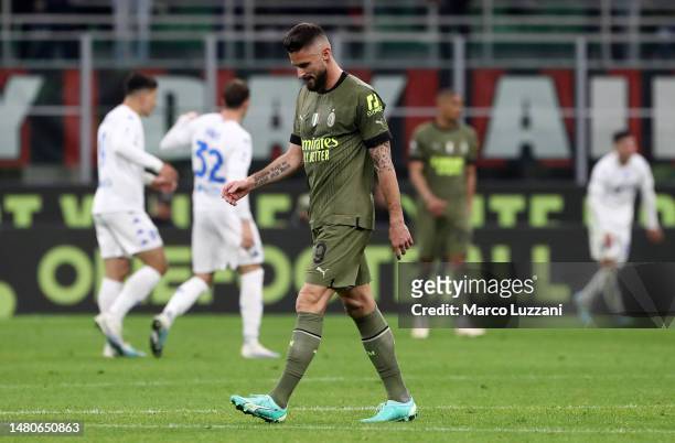 Olivier Giroud of AC Milan looks dejected following the team's draw in the Serie A match between AC Milan and Empoli FC at Stadio Giuseppe Meazza on...