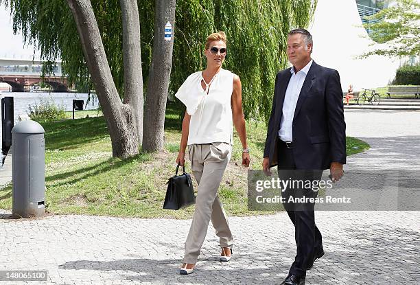 Franziska van Almsick and Juergen B. Harder arrive for a boat tour with the Monaco royal couple on the Spree canal on July 9, 2012 in Berlin,...