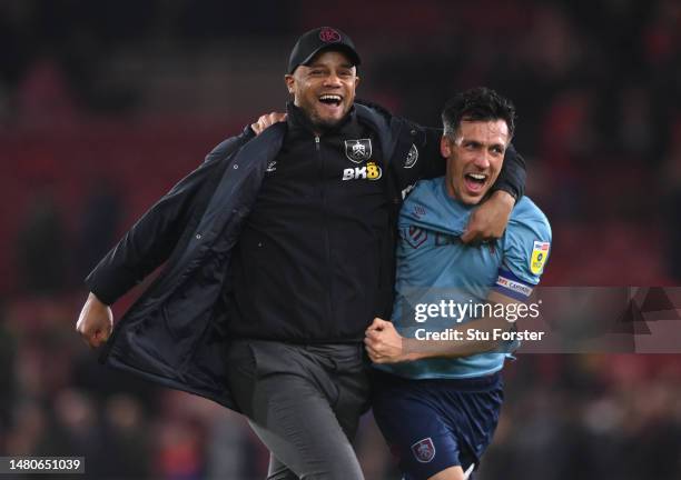 Burnley Manager Vincent Kompany celebrates with Jack Cork after Burnley had sealed promotion after the Sky Bet Championship between Middlesbrough and...