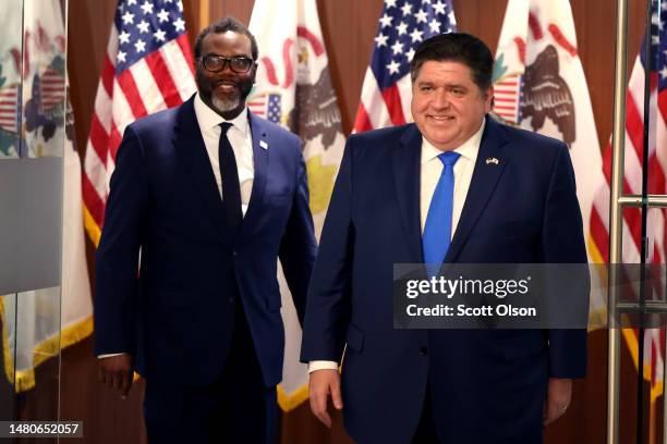 Chicago Mayor-Elect Brandon Johnson and Illinois Governor J.B. Pritzker prepare to speak to the press after a meeting in the governor's office on...