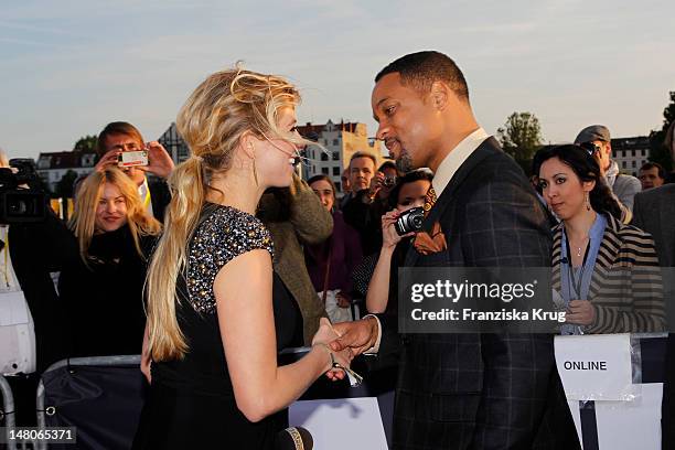 Nina Eichinger and Will Smith attend the Men In Black 3 Germany Premiere at O2 World on May 14, 2012 in Berlin, Germany.