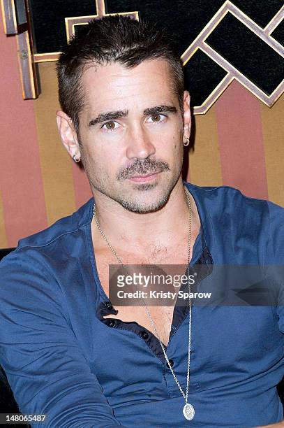 Colin Farrell poses during the 'Total Recall' photocall at the Hotel Costes on July 9, 2012 in Paris, France.
