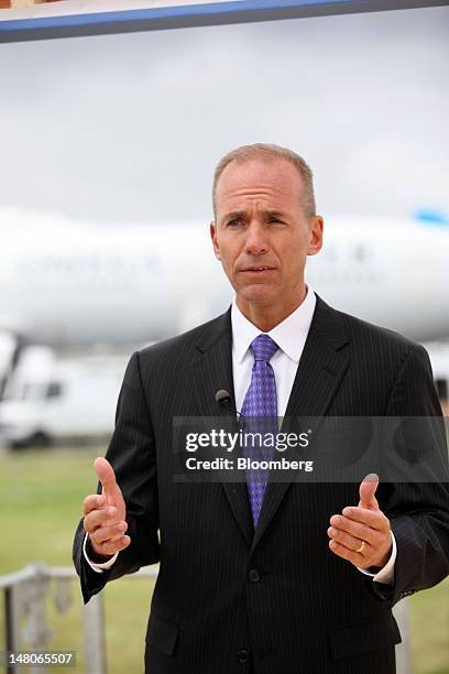 Dennis Muilenburg, chief executive officer of Boeing Co.'s defense division, gestures during a Bloomberg Television interview on the first day of the...