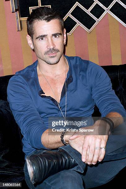 Colin Farrell poses during the 'Total Recall' photocall at the Hotel Costes on July 9, 2012 in Paris, France.