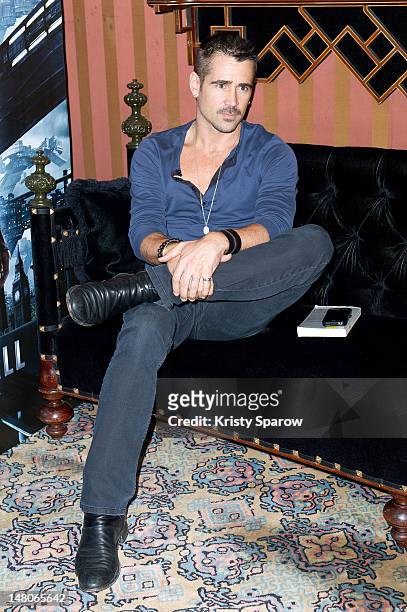 Colin Farrell poses during the 'Total Recall' photocall at the Hotel Costes on July 9, 2012 in Paris, France.