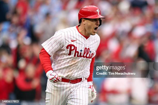 Realmuto of the Philadelphia Phillies reacts after hitting a two run home run during the seventh inning against the Cincinnati Reds at Citizens Bank...