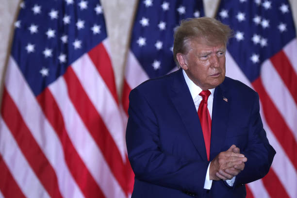 Former U.S. President Donald Trump claps during an event at the Mar-a-Lago Club April 4, 2023 in West Palm Beach, Florida. Trump pleaded not guilty...