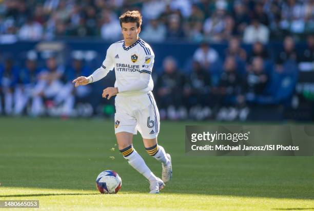 Riqui Puig of the LA Galaxy moves with the ball during a game against the Seattle Sounders FC at Dignity Health Sports Park on April 1, 2023 in...
