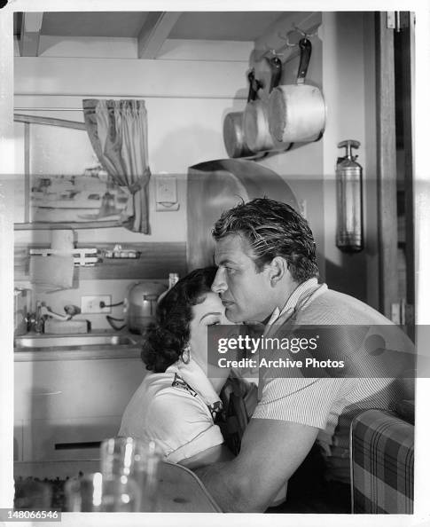 Richard Egan and Jane Russell in a warm pensive mood in a scene from ...