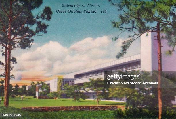 Vintage colorized historic souvenir photo postcard published circa 1935 as part of a series titled, 'Moon Over Miami,' depicting a view of the modern...