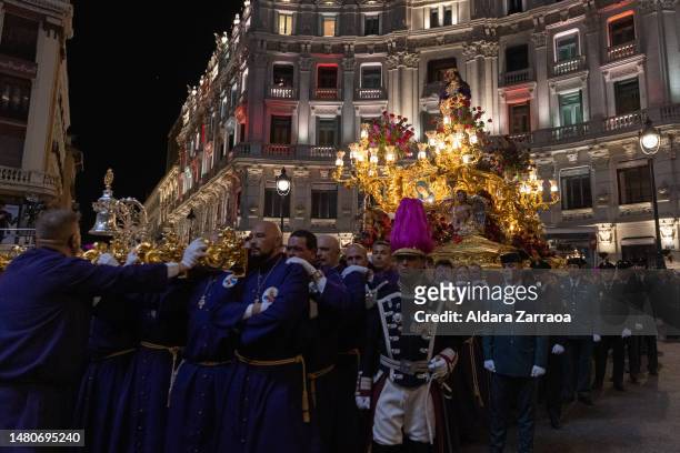 People carry The Jesus de Medinaceli figure during The Jesus de Medinaceli Easter Procession on April 07, 2023 in Madrid, Spain.