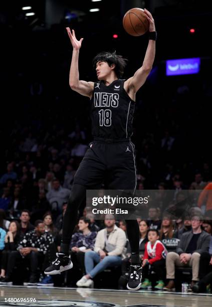 Yuta Watanabe of the Brooklyn Nets grabs the rebound in the fourth quarter against the Orlando Magic at Barclays Center on April 07, 2023 in the...